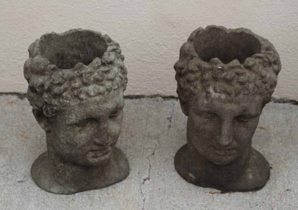 Two Stone Face Planters: Stone face planters, lot of (2), 13" x 10".
