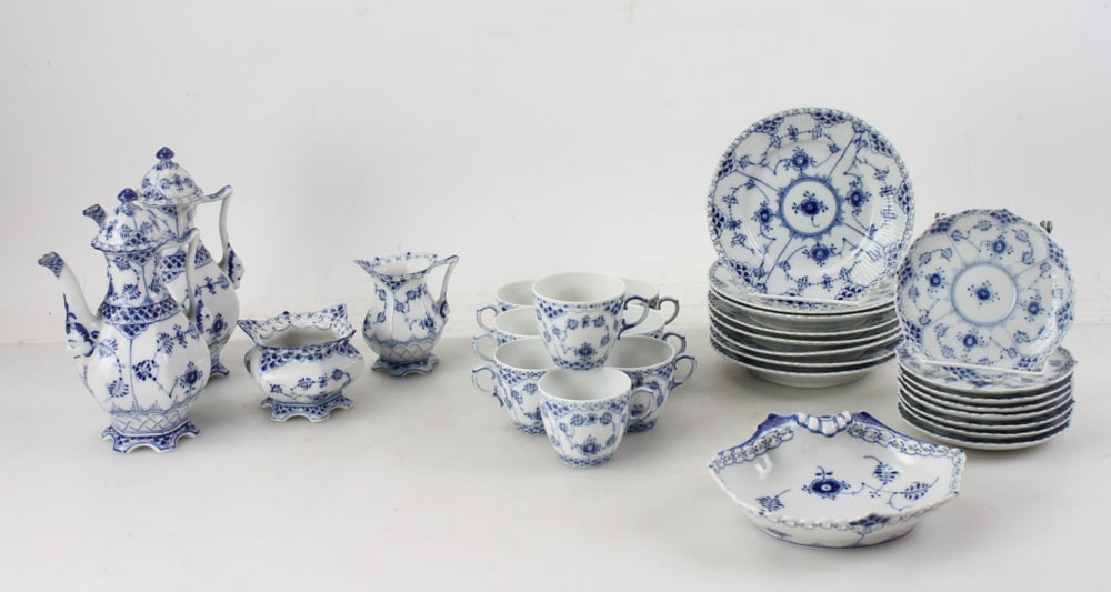 Royal Copenhagen Blue Fluted Full Lace Coffee Set, Shell Dish: Royal Copenhagen "Blue Fluted Full Lace" china, to include: (2) gargoyle pattern coffee pots, #1030; (1) creamer, #1032; (1) sugar bowl, #1112; (8) coffee cups and saucers, #1035; (8) plates, 6 1/2",