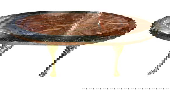 Mid-century Oval Marble-Top Table on Brass Legs: Mid-century oval marble-top table on brass legs with Rose Medallion faces, 16" H x 68" W x 33" D. Provenance: Palm Beach, Florida estate.