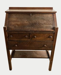 L. & J.G. Stickley Quarter-Sawn Oak Slant-front Desk: Quarter-sawn oak slant-front desk, "The Work of L. & J.G. Stickley", #660, circa 1915, with pigeon hole interior, 40" x 30" x 17". Provenance: Manchester, Massachusetts collection.