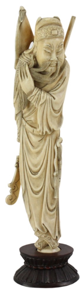 19thC Chinese Carved Bone Figure on Wood Stand: 19th century Chinese carved bone standing figure on wood stand, 12" x 2 1/2". Provenance: Estate of Helen Boag.