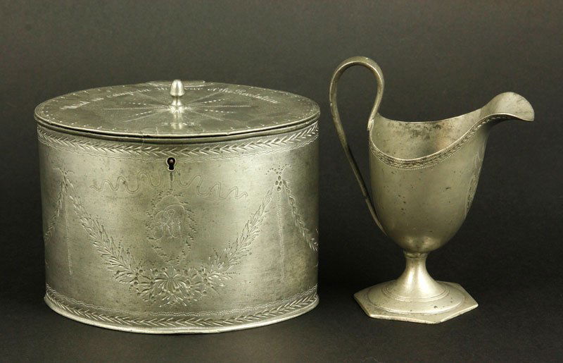 1781 Pewter Tea canister and Pitcher: Rare oval tea canister and cream pitcher, pewter, dated 1781, floral engraved with initial "RW", Robert Wilson accepted the delivery of the colors of the British Regiments, twenty-eight in number at t