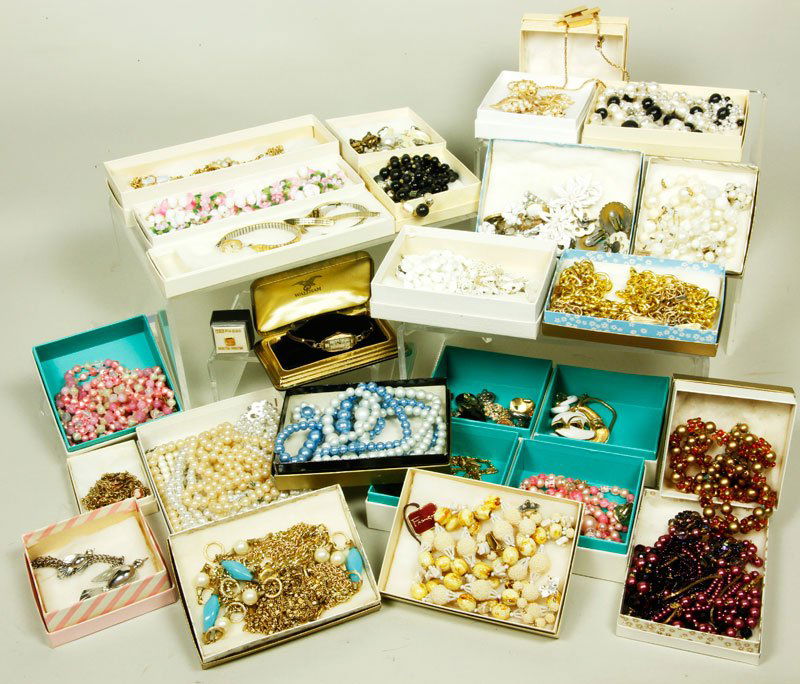 Lot of Costume Jewelry: Lot of costume jewelry, to include; earrings, necklaces, brooches, ladies watches, several suites of jewelry, some labeled Trifari, Lisner, 14k gold filled, Coro, Giovanni, Hong Kong.