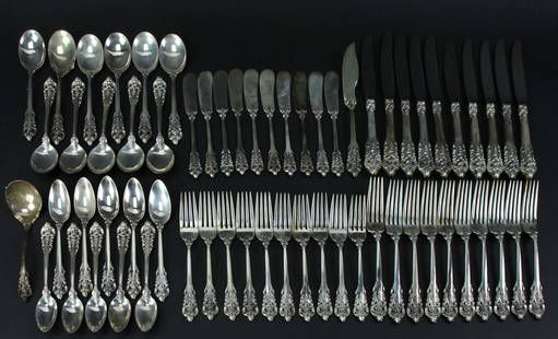 Wallace Grande Baroque Sterling Flatware Partial Service: Partial service of Wallace "Grande Baroque" sterling flatware, (62) pieces total. Approximately 80.0 troy oz TW (allowing 0.5 oz for each of (10) knives with non-sterling blades). Provenance: Methuen,