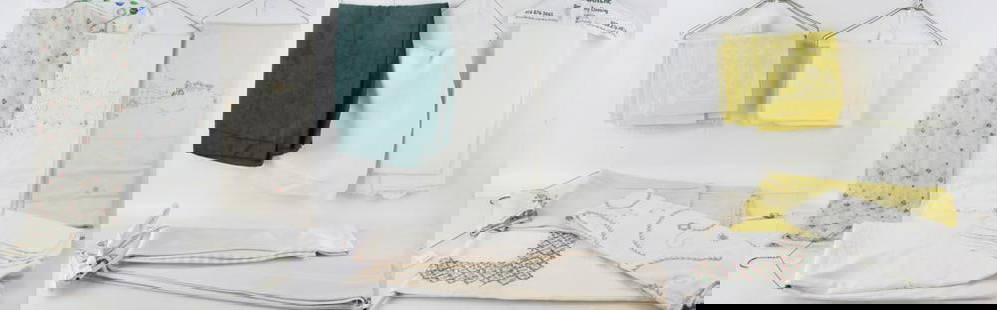 Large Lot of Linens, Tablecloths, Napkins, Drapes: Large lot of linens, tablecloths, napkins, two panels of lace drapes. All dry cleaned and on hangers, etc. Provenance: Salem, Massachusetts collection.