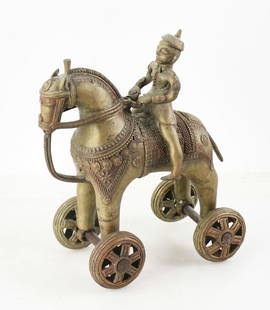 Old Indian Brass Temple Toy, Man on Horse: Old Indian brass temple toy, man on horse with wheels, 12" x 10". Provenance: Methuen, Massachusetts estate.
