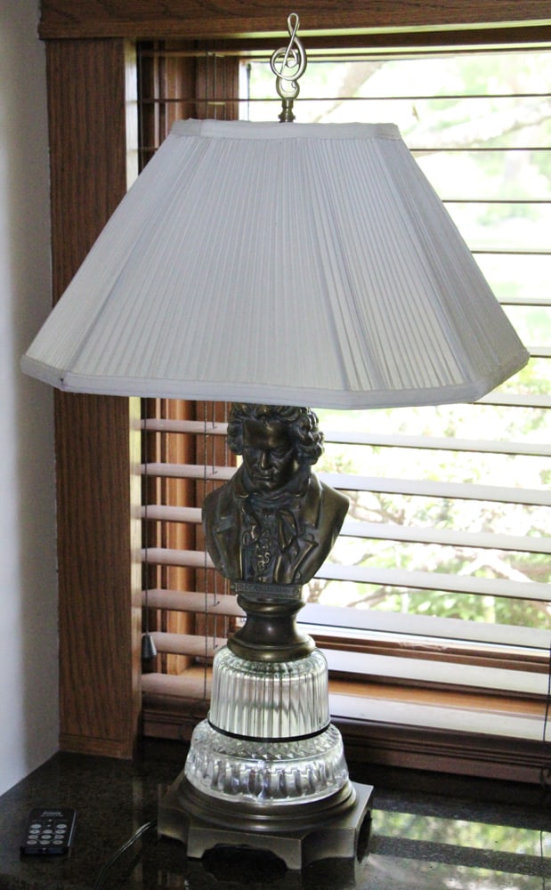 Brass Sculptural Lamp of Beethoven: Brass sculptural lamp of Beethoven with shade and clef finial, 27" H. Provenance: Gloucester, Massachusetts estate.