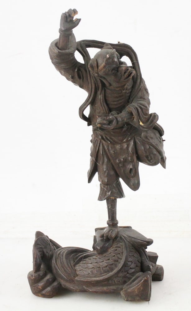 Chinese Buddhist or Taoist Iconography Figure: Chinese carved figure with fierce expression, Buddhist or Taoist iconography, 13" x 7" x 4". Provenance: Methuen, Massachusetts estate.