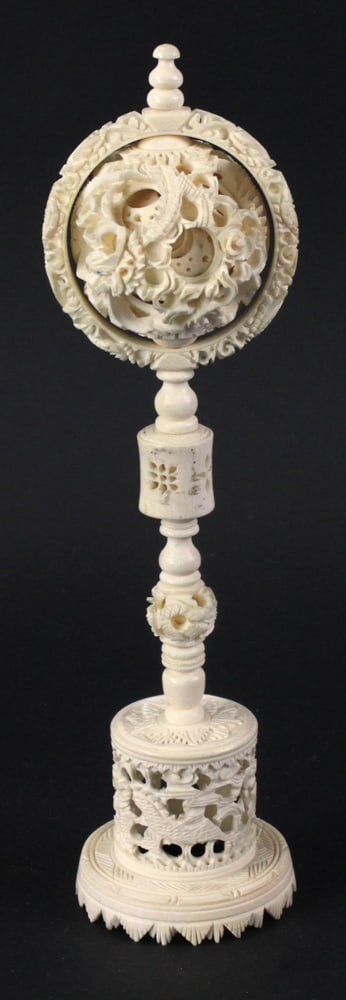 Bone Chinese Mystery Ball on Stand: Bone Chinese mystery ball on stand, ball approximately 1 3/4" diameter, overall 9 3/4" H. Provenance: Danvers, Massachusetts collection.