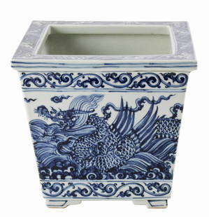 Chinese Blue and White Flower Pot: Chinese flower pot decorated with fine painted flying dragon over the sea, Ming Xuande mark on base.
