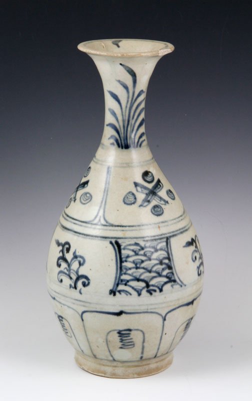 Vietnamese 15th C. Blue and White Bottle Vase: Blue and white bottle vase, Vietnam, 15th century, the pear form decorated with scrolling flowers and wave patterns, 12" h. From the Hoi An shipwreck; a very important record of the types of Vietnames