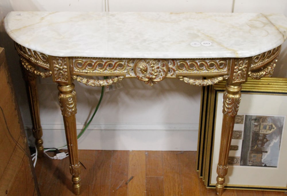 French Giltwood Pier Table with Onyx Top: French giltwood pier table having onyx top, 30" H x 46" W x 16" D. Provenance: From a famous Park Avenue, New York hotel.