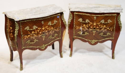 Pair of Louis XV Style Marble Top Bombe Chests: Pair of Louis XV-style bombe chests having floral inlay and marble tops, 30 1/2" H x 32" W x 15 1/2" D. Provenance: Estate of August van der Becq, Westport, Connecticut.