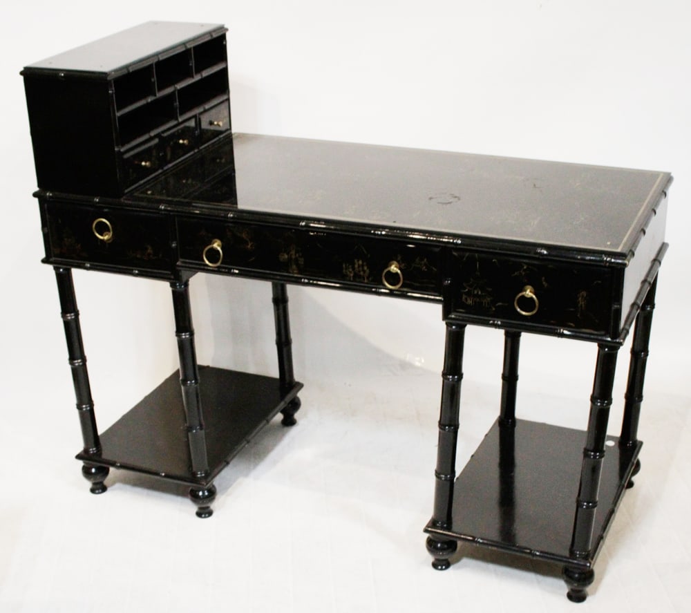 Black Lacquered Chinoiserie Painted Writing Desk: Black lacquered and chinoiserie painted writing desk with glass tops, 39" H x 48" W x 20" D. Provenance: The Susie Hilfiger Collection.