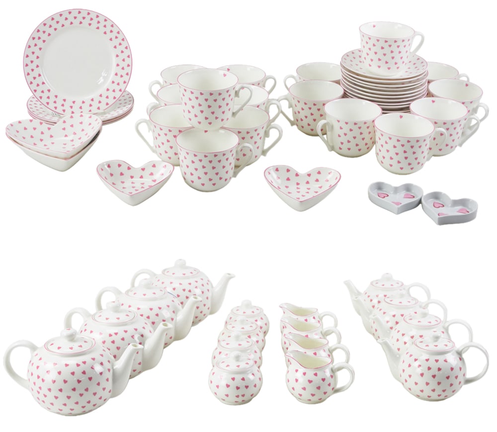 Nina Campbell by Roy Kirkham English Fine Bone China: Nina Campbell by Roy Kirkham, English fine bone china with pink hearts, plus two D. Porthault pink heart dishes. (57) pieces. Provenance: The Susie Hilfiger Collection.