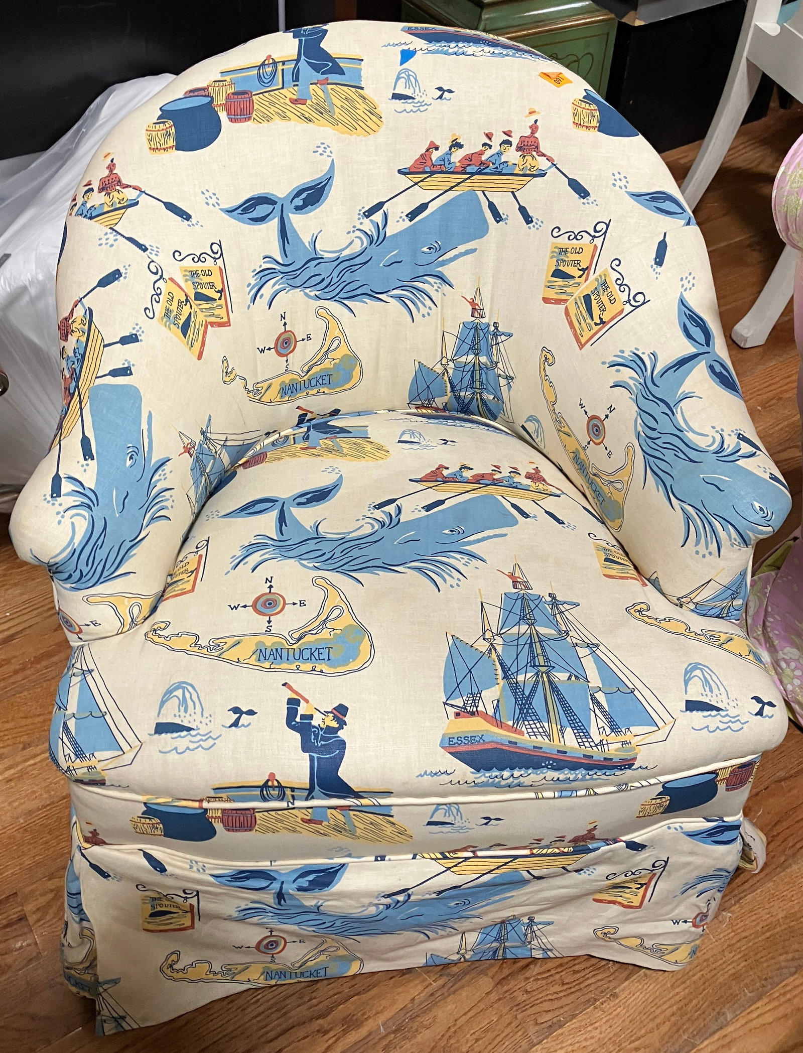 Nantucket Upholstered Fabric Armchair: Nantucket upholstered fabric armchair, 28" H x 26" W x 28" D. Provenance: The Susie Hilfiger Collection.