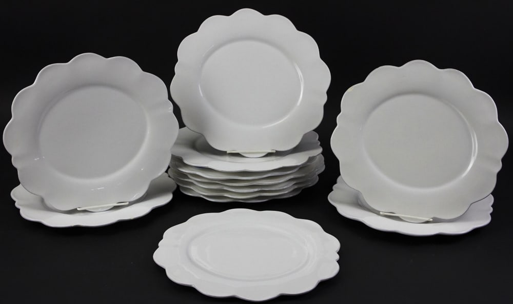 Cote Table Ivory-color Dinner Plates: Ivory-color Cote Table dinner plates, (12) 11". One chipped. Provenance: The Susie Hilfiger Collection.