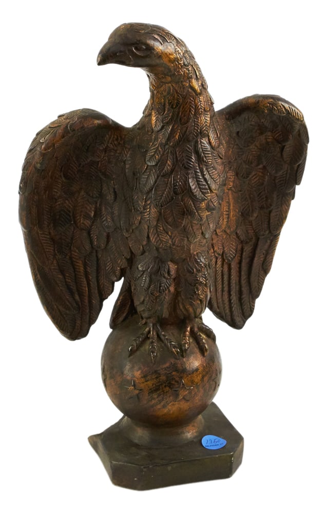 Bronzed Decorated Standing Eagle on Ball: Bronzed decorated standing eagle on ball, 18" x 11". Provenance: The Susie Hilfiger Collection.