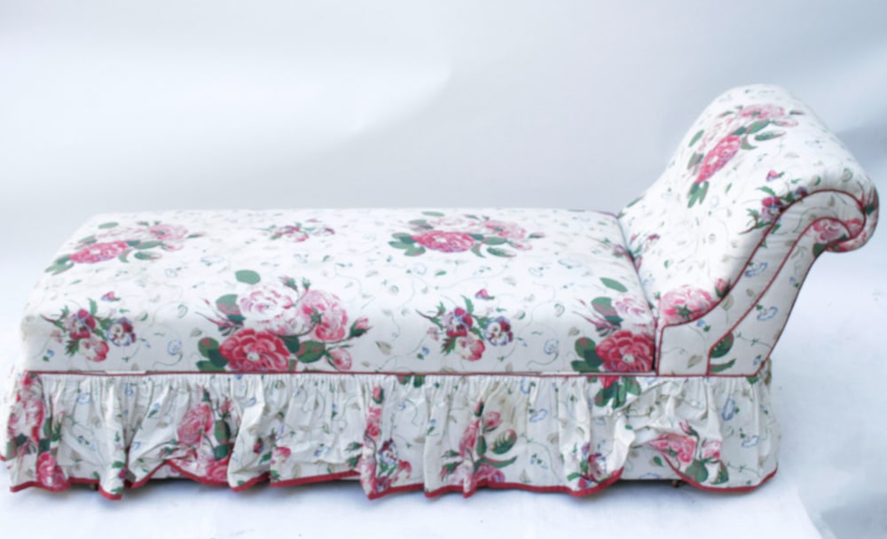 Chaise Lounge with Chintz Upholstery: Chaise lounge with floral chintz upholstery, 28" H x 24" W x 65" L. Provenance: The Susie Hilfiger Collection.