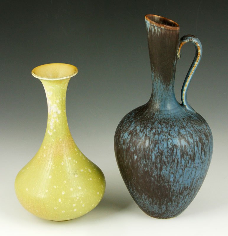 2 Pieces of Swedish Rorstrand Pottery: Two pieces of Rorstrand Pottery, Sweden, by Gunnar Nylund, one pitcher, 8 3/4" h and one vase, 6 1/2" h, each signed and marked on base.