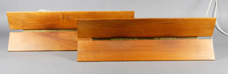 Pair of Lightolier Mid-Century Wall Sconces: Pair of Lightolier Mid-Century Modern wall sconces, teak and metal, 6 1/4" h x 20" w x 4 1/2" d, operational condition unknown.