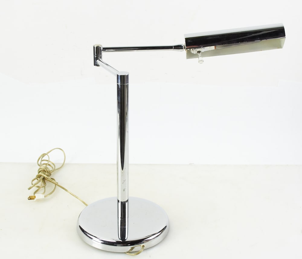Modern Chrome Desk Lamp: Modern chrome desk lamp, 16" x 16". Working. Provenance: The Susie Hilfiger Collection.