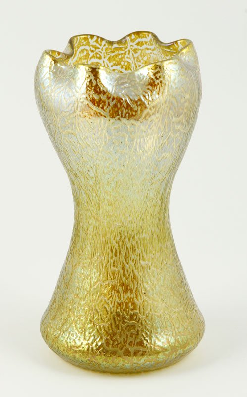 Loetz Candia Mimosa Vase: Loetz Candia Mimosa vase, hourglass shaped with ruffled rim and gold iridescence, 7 3/4"h.