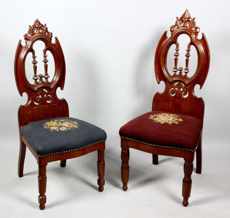 2 19th C. Gothic Chairs: Two late 19th century Gothic chairs with needlepoint upholstery. Usual wear.