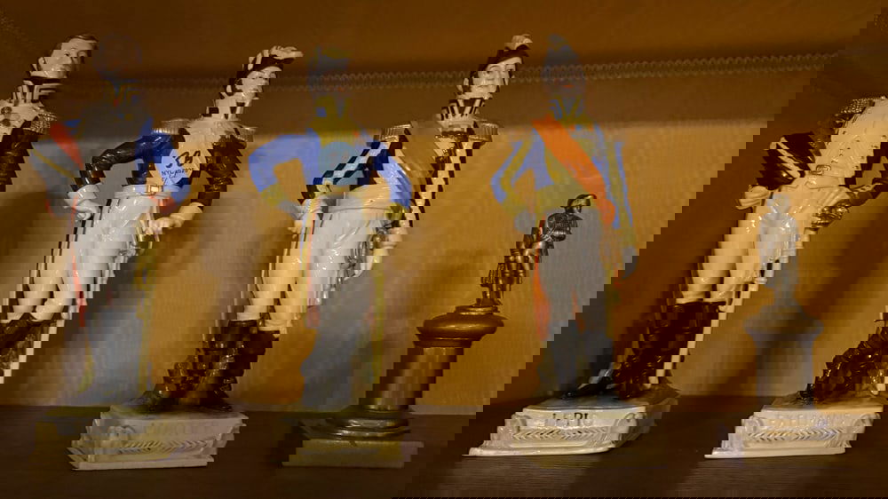 BISQUE, METAL AND PORCELAIN FIGURES: BISQUE, METAL AND PORCELAIN FIGURES - 4 Napoleonic Generals and military leaders, three large, one small metal 9", 9", 9", 5"