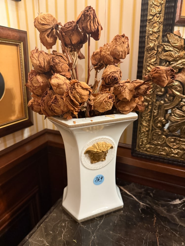 GIANNI VERSACE PORCELAIN VASE WITH DRIED ROSE SPRAY: GIANNI VERSACE PORCELAIN VASE WITH DRIED ROSE SPRAY - white with gilt decorations 9" x 6"