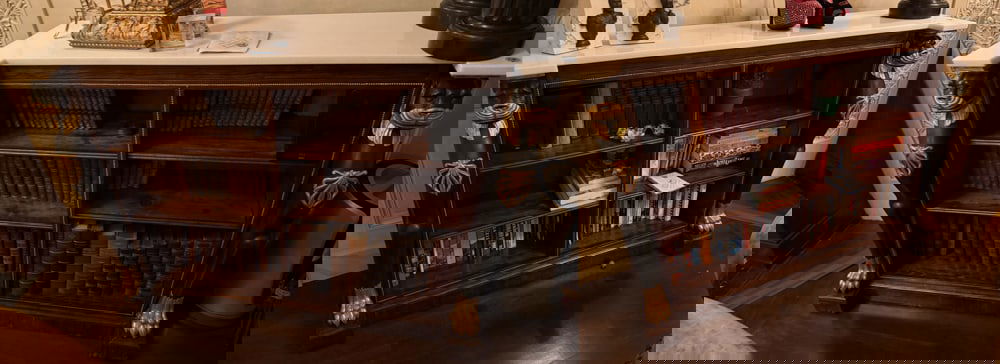 PAIR OF ENGLISH ROSEWOOD, PARCEL-GILT AND EBONIZED DWARF BOOKCASES (1 of 4)