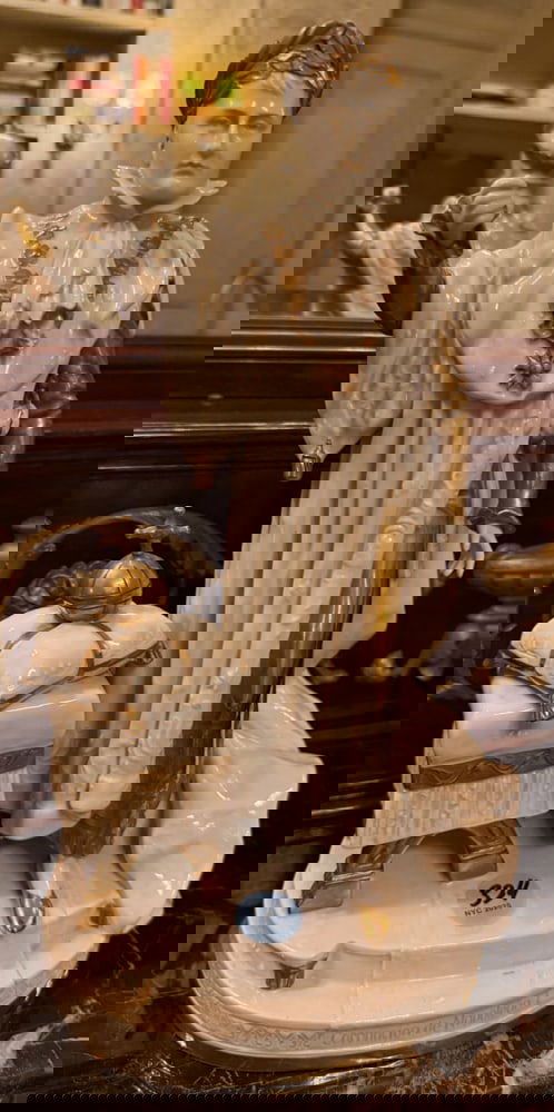 LARGE BISQUE FIGURE OF EMPEROR NAPOLEON: LARGE BISQUE FIGURE OF EMPEROR NAPOLEON - bisque with gilt and white glazes, 14" H x 8".