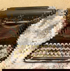 EARLY CORONA TYPEWRITER: Early Corona typewriter, 9" x 11".