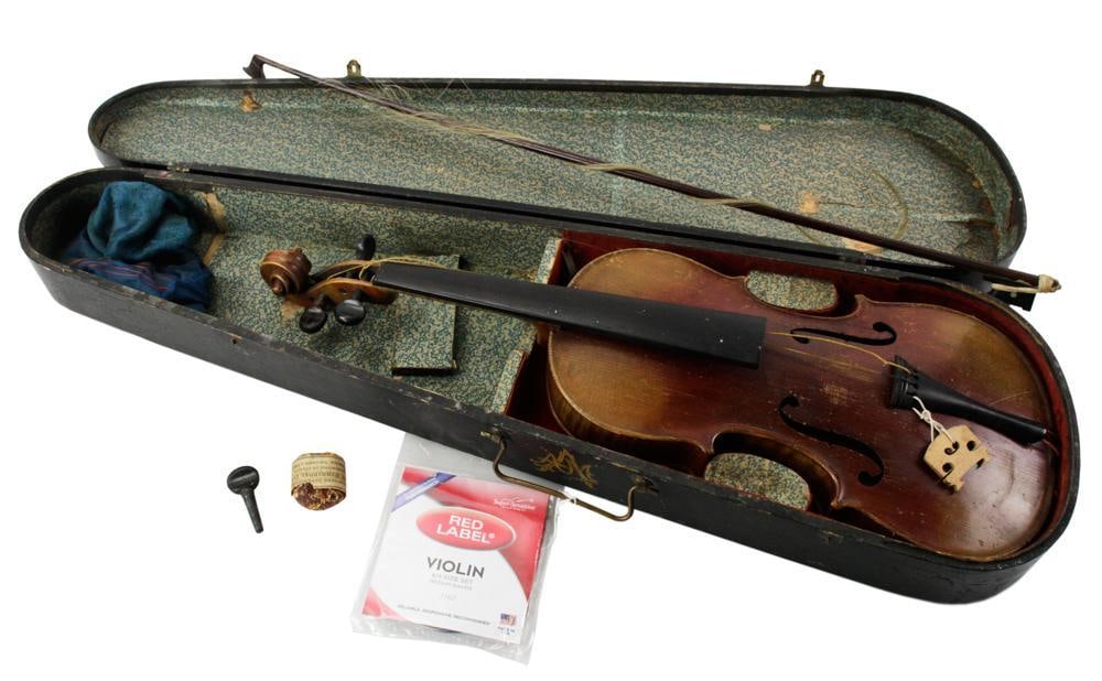 Student Violin in Wooden Case, with Bow: Student violin in wooden case, marked Stradivarius, 23 1/4" L x 8" W. Also includes 28" L bow, unmarked. As Found condition. Provenance: Lynnfield, Massachusetts collection.