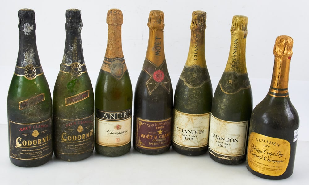 Group of Vintage Champagnes: Group of vintage champagnes, 750ml. Seven (7) bottles to include: Chandon Napa Valley Brut, two (2) bottles; 1984 Codorniu Brut Clasico, two (2) bottles; 1983 Moet & Chandon, Brut Imperial Rose; 1979