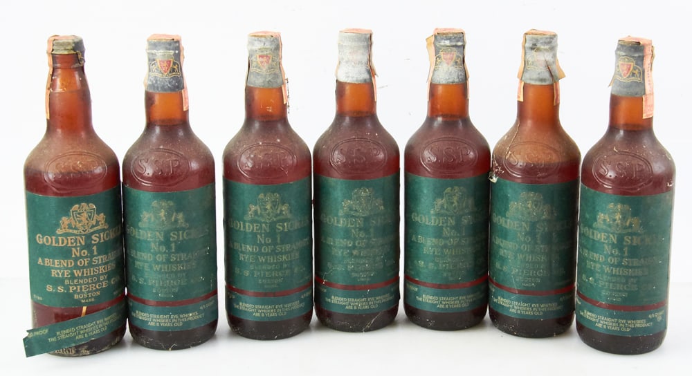 Golden Sickle No. 1 Blend of Straight Rye Whiskies: Golden Sickle, No. 1, blend of straight Rye whiskies, 8 years old, 90 proof, 4/5 bottle, seven (7) bottles total. Provenance: South Hamilton, Massachusetts collection.