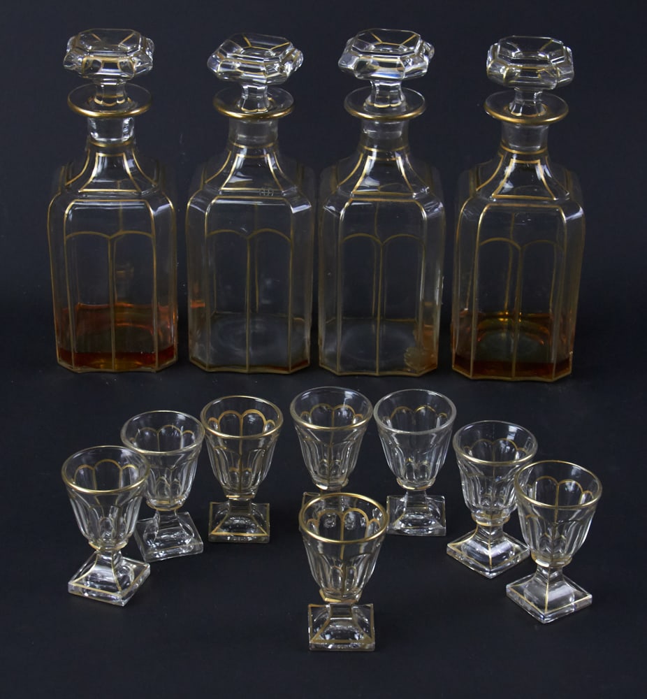 Bohemian Blown Glass Decanter Set with Glasses: Set of four bohemian blown glass decanters with eight matching cordial glasses. Decanters 8 1/4" H. Provenance: South Hamilton, Massachusetts collection.