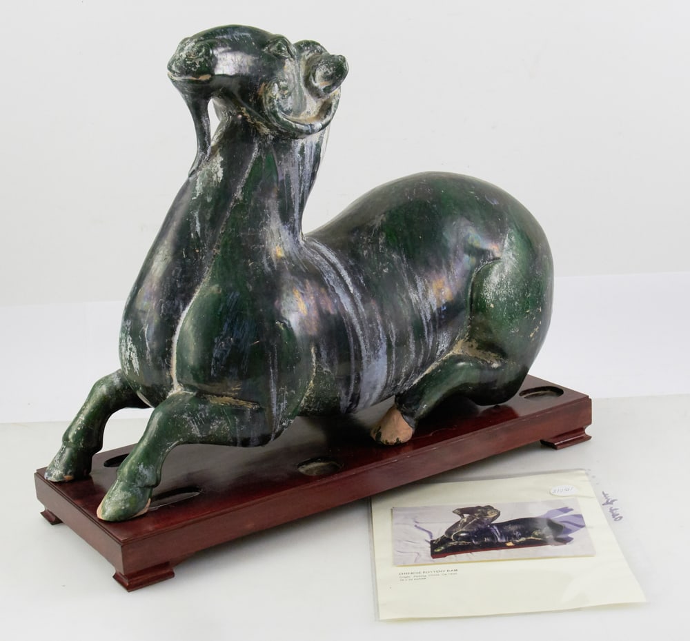 Tang Dynasty Statue of Ram: Tang Dynasty statue of a ram, 16" x 22" x 10". Good condition. Provenance: Estate of David and Sarah Martin, Montecito, California.