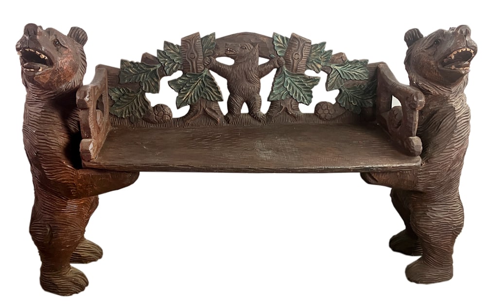 German Black Forest Carved Bear Hall Bench: German Black Forest carved bear hall bench, circa 1880 or earlier. Large bears with glass eyes, additional bear carved on seat back splat with painted foliage, flowers carved and painted on seat, 36" 