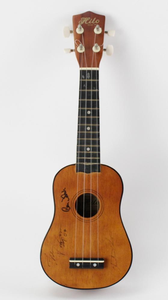 Hilo Ukulele, Signed by Beach Boys Members: Hilo Ukulele, model 2656, wood with ebony, signed by members of The Beach Boys, Brian Wilson, Mike Love, Bruce Johnston, 21". Provenance: Hyannisport, Massachusetts collection.