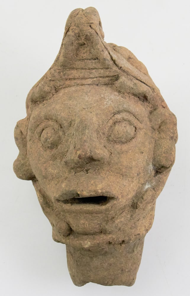 Pre-Columbian Terra Cotta Effigy Head Face: Pre-Columbian terra cotta pottery effigy head face, 6 1/2" x 4". Provenance: Estate of David and Sarah Martin, Montecito, California.
