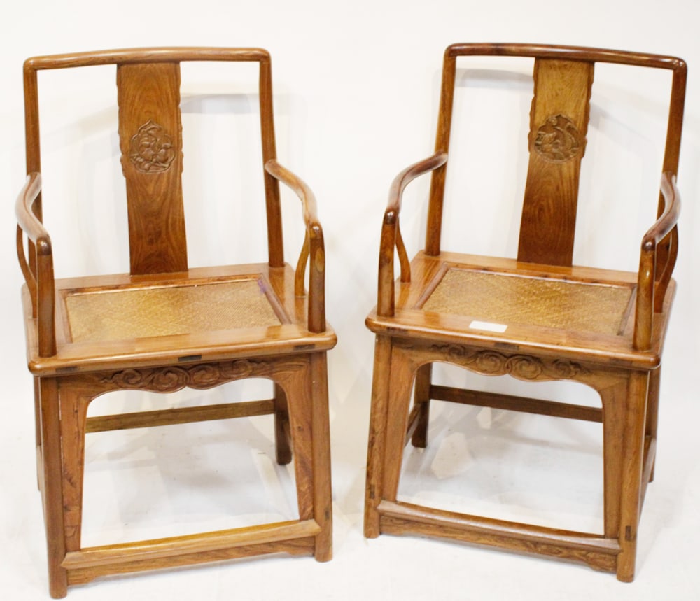 Pair of Huanghuali Chairs with Wicker Seats: Pair of huanghuali chairs with wicker seats, 36" H. Provenance: The Collection of Zhang Dinghuang of Atlanta, Georgia. Zhang Dinghuang 張定璜 (1895-1986), also known as Chang Feng-ch