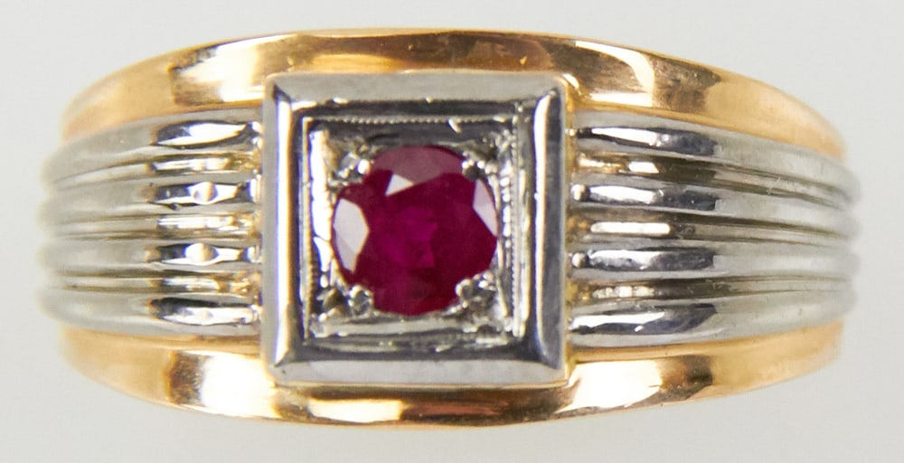 Men's 18k White and Yellow Gold Ruby Ring: Men's 18k white and yellow gold two-tone ring with 0.40 ct ruby. Size 11. Approximately 8.90 grams TW. Provenance: Miami Beach, Florida collection. PLEASE NOTE: payment for silver, gold, jewelry, and