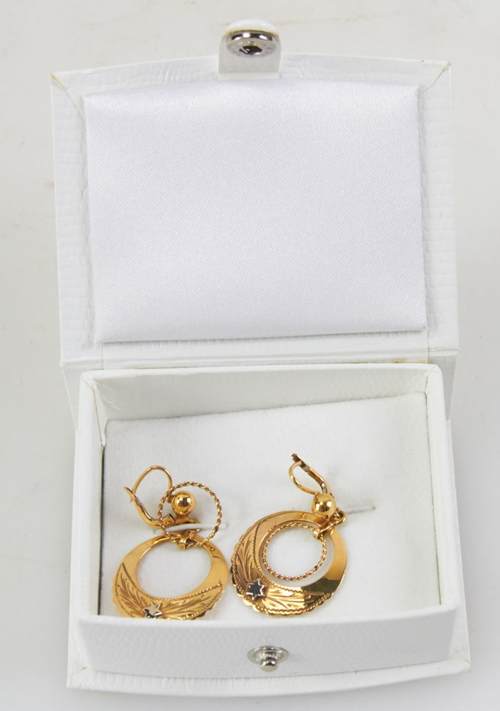 Pair of 18k Gold Double Hoops with Star: Pair of 18k gold double hoops with star. Approximately 6.20 grams TW. Provenance: Miami Beach, Florida collection. PLEASE NOTE: payment for silver, gold, jewelry, and coins must be made via wire trans