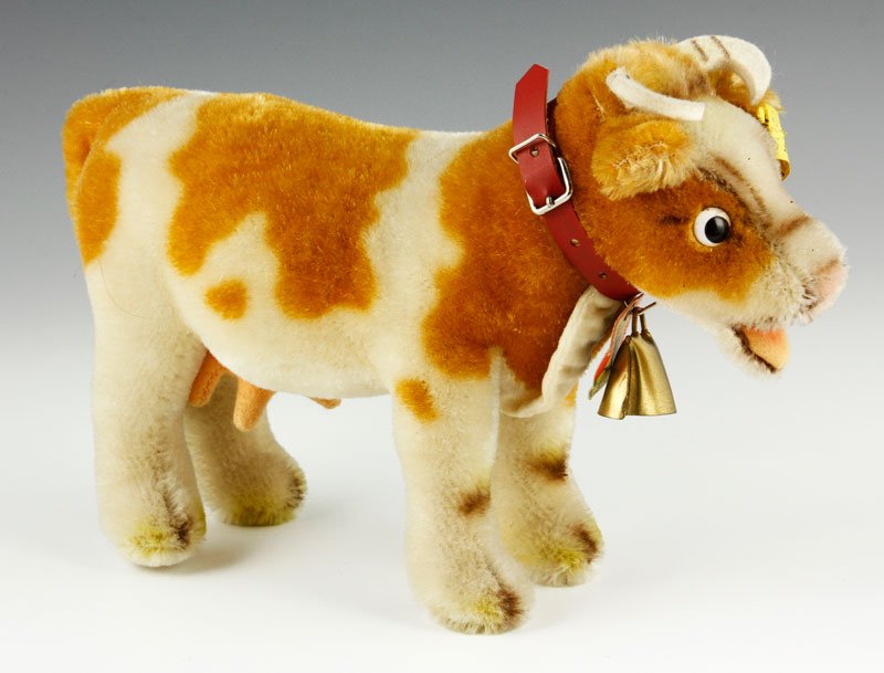 Steiff "Bessy," Cow: Steiff "Bessy," cow, with paper tag, ear tag and button, 9 1/2" l.