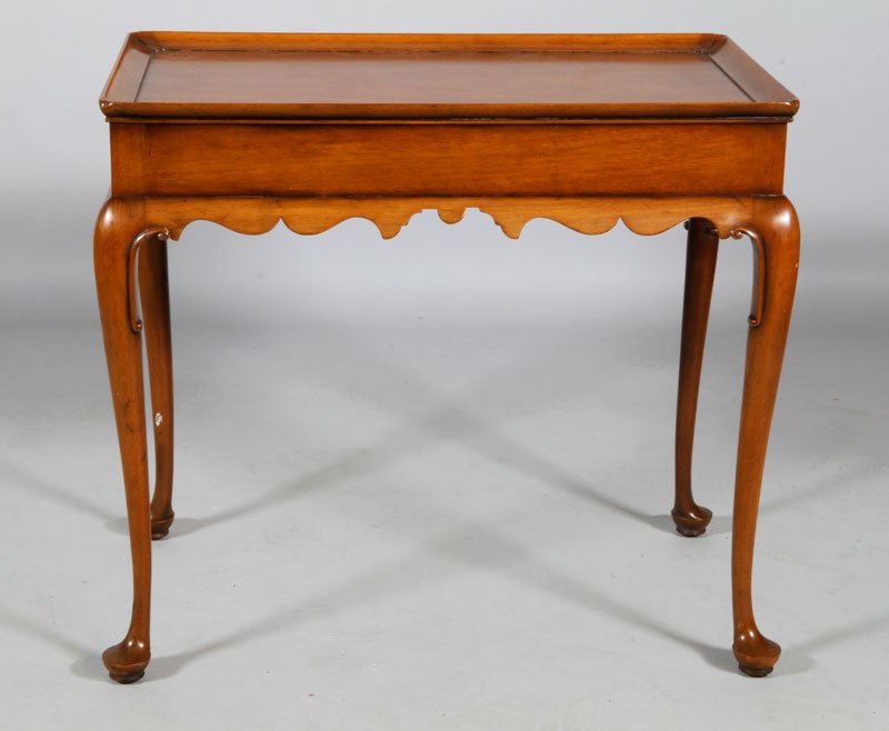 Queen Anne Style Tea Table: Queen Anne mahogany style tea table, Kittinger Colonial Williamsburg stamp, has branded mark labeled Kittinger of Buffalo, 26" x 29" x 18".