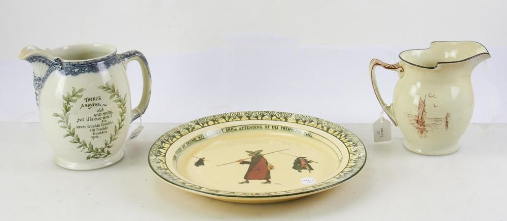 19th/20thC Doulton England Jugs and Charger: Late 19th/early 20th century Doulton England pieces, to include: two (2) jugs, one titled verso "Old Sea Dogs", and one motto jug, 8 1/4" H; one (1) charger with fly fishing motif, 14" diameter. All g