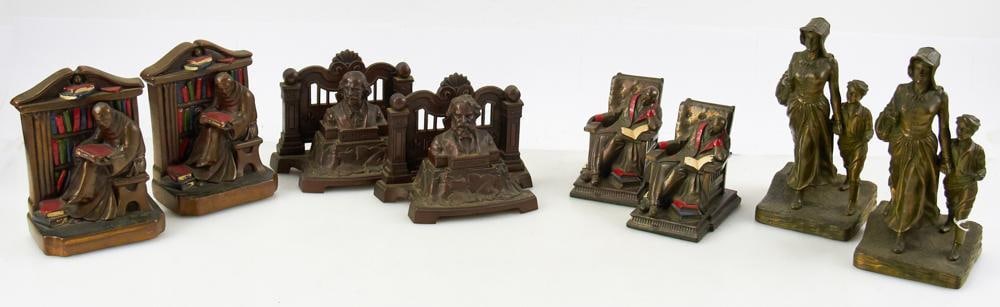 Group of Vintage Bookends: Group of vintage bookends, to include bronzed pair titled "Pioneer Woman" by Jennings Brothers, and three pairs of seated gentlemen. Four (4) pairs total. Tallest 8 3/4". Good condition. Provenance: E