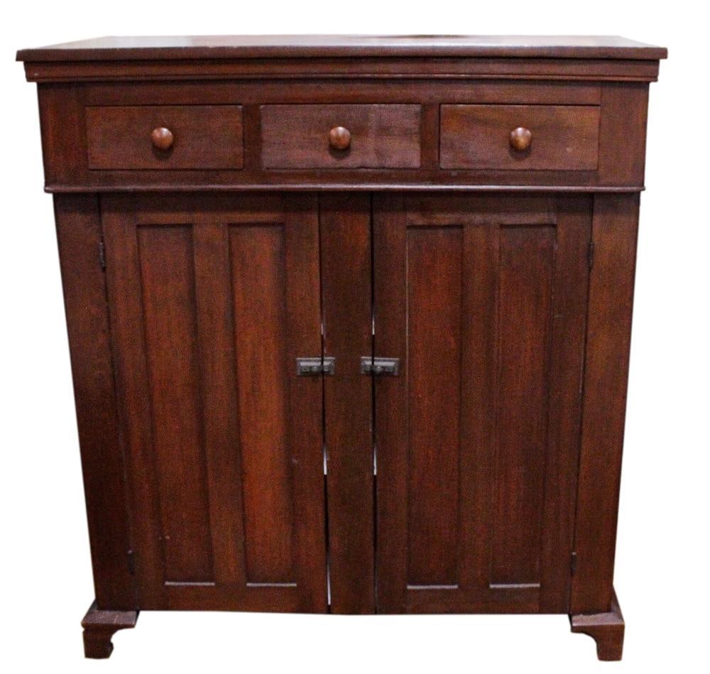 19thC Cupboard Made for Sea Captain: 19th century three-drawer two-door cupboard, pegged and dovetailed construction, hand-chamfered door panel, inside middle drawer indicates in pencil "Cupboard was made for sea captain". Name of maker