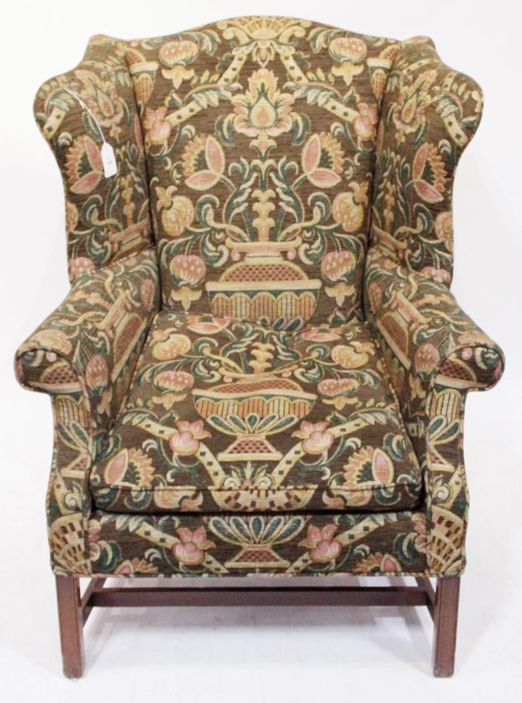 Hepplewhite-style Upholstered Wingback Chair: Hepplewhite-style upholstered wingback chair, 46" H x 30" W x approximately 28" D. Good condition. Provenance: Estate of Dalia Zikas, Melrose, Massachusetts.